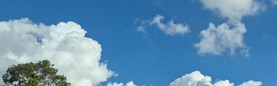 landscape photo the blue sky with puffy white clouds